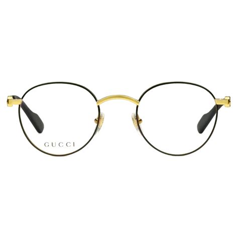 gucci gold round frame glasses.